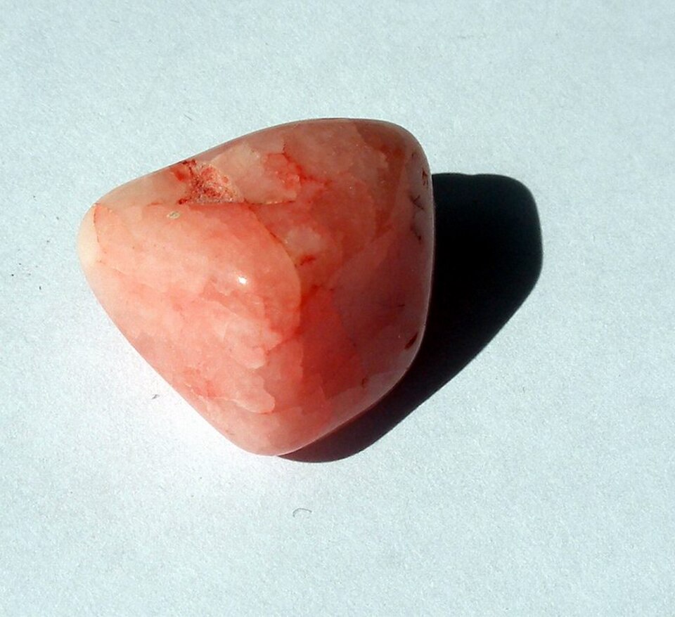 A rough translucent pink rose quartz specimen
